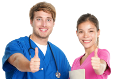 Two nurses doing a thumbs-up sign